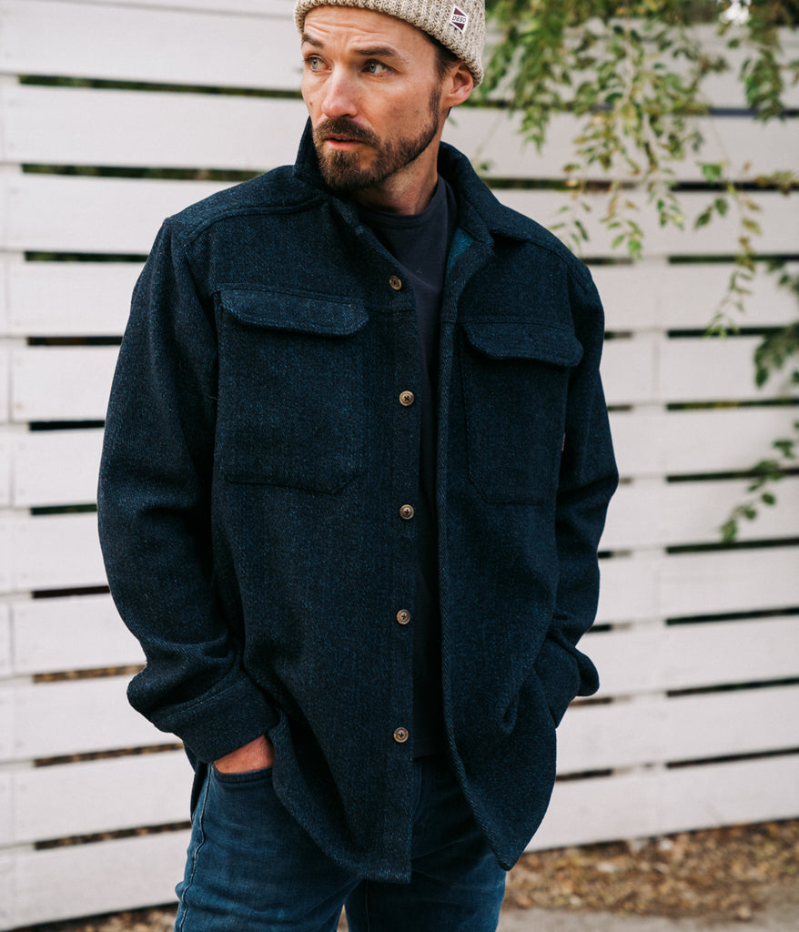 A man wearing Willy Wool Overshirt by Deso supply co.