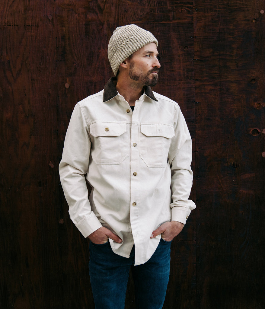 A man wearing workshop shirt by Deso Supply Co.