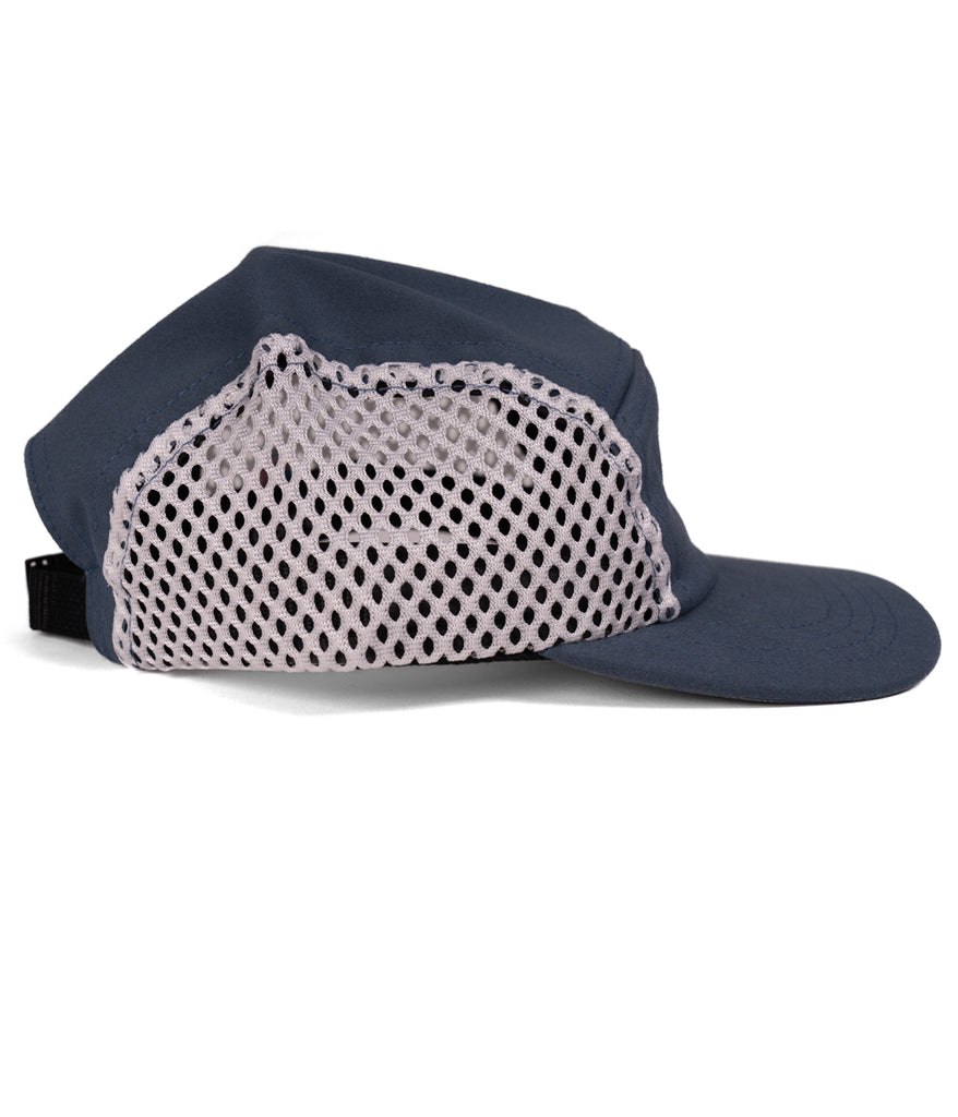 Jogger Camper Running Cap in orion blue color by Deso Supply Co. from the side view. 1