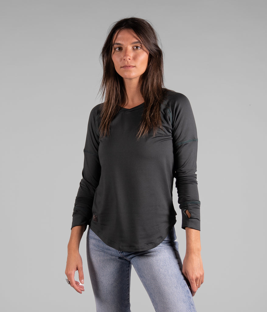 A woman wearing Maggie Long sleeve in forest black color by Deso Supply Co.