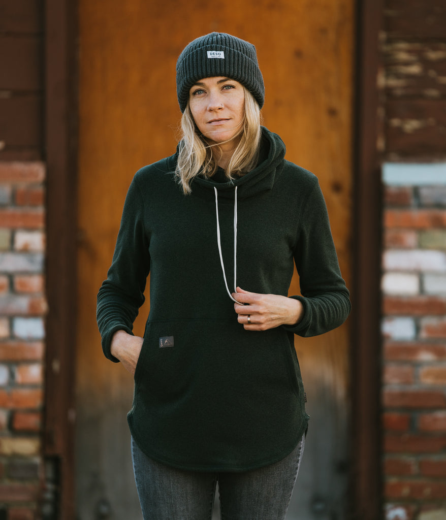 A woman wearing Tallac Pullover in charcoal forest by Deso Supply Co.