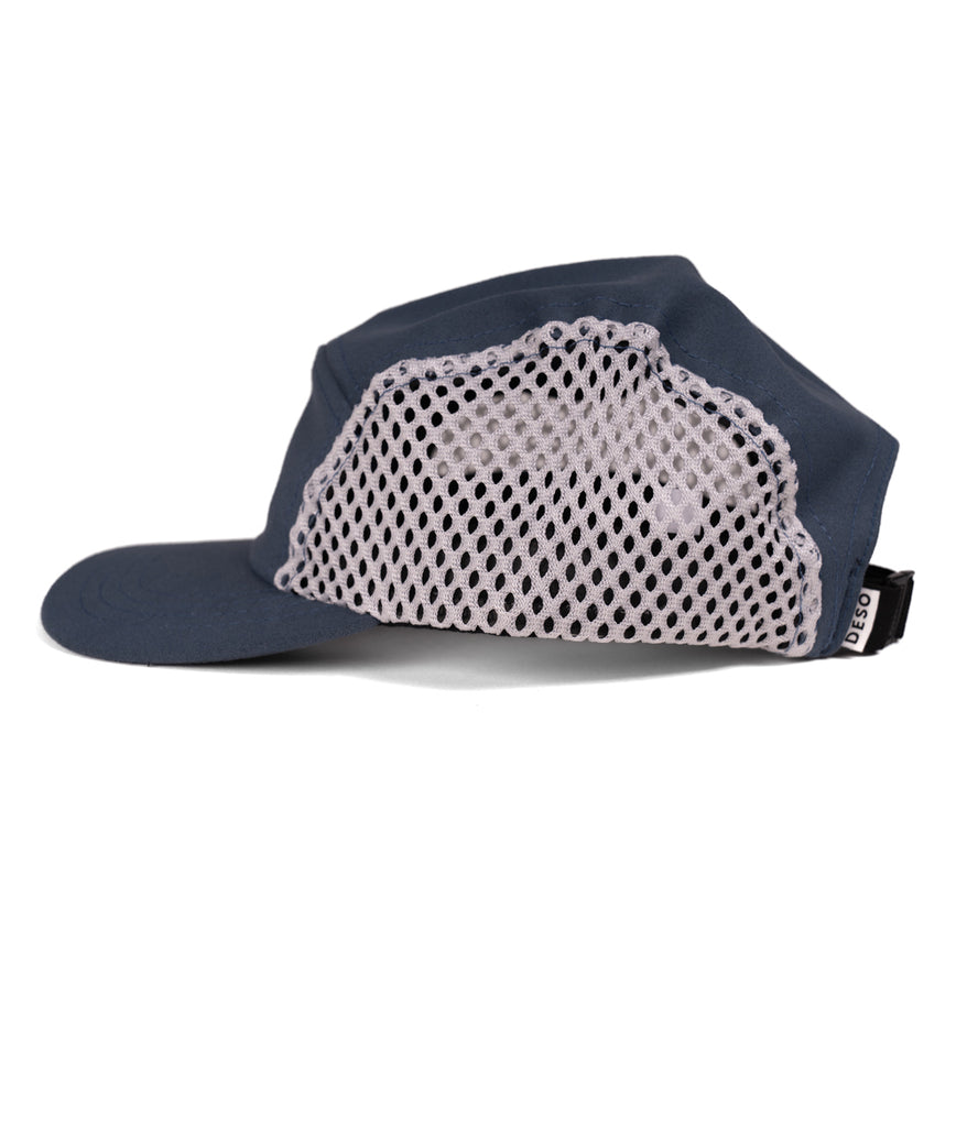 Jogger Camper Running Cap in orion blue color by Deso Supply Co. from the side view.