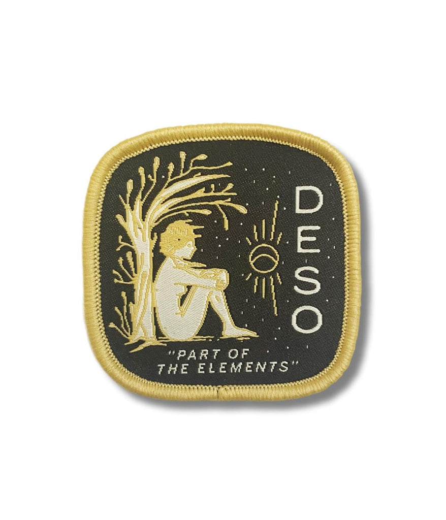 Part of the Elements Sew On Patch in dark grey & gold by Deso Supply Co.